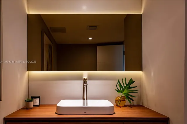 a vase of flowers sitting on a table