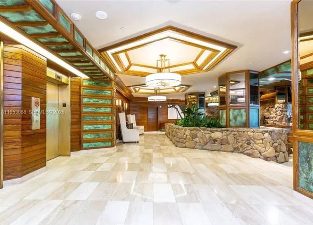 a view of a building with a glass door