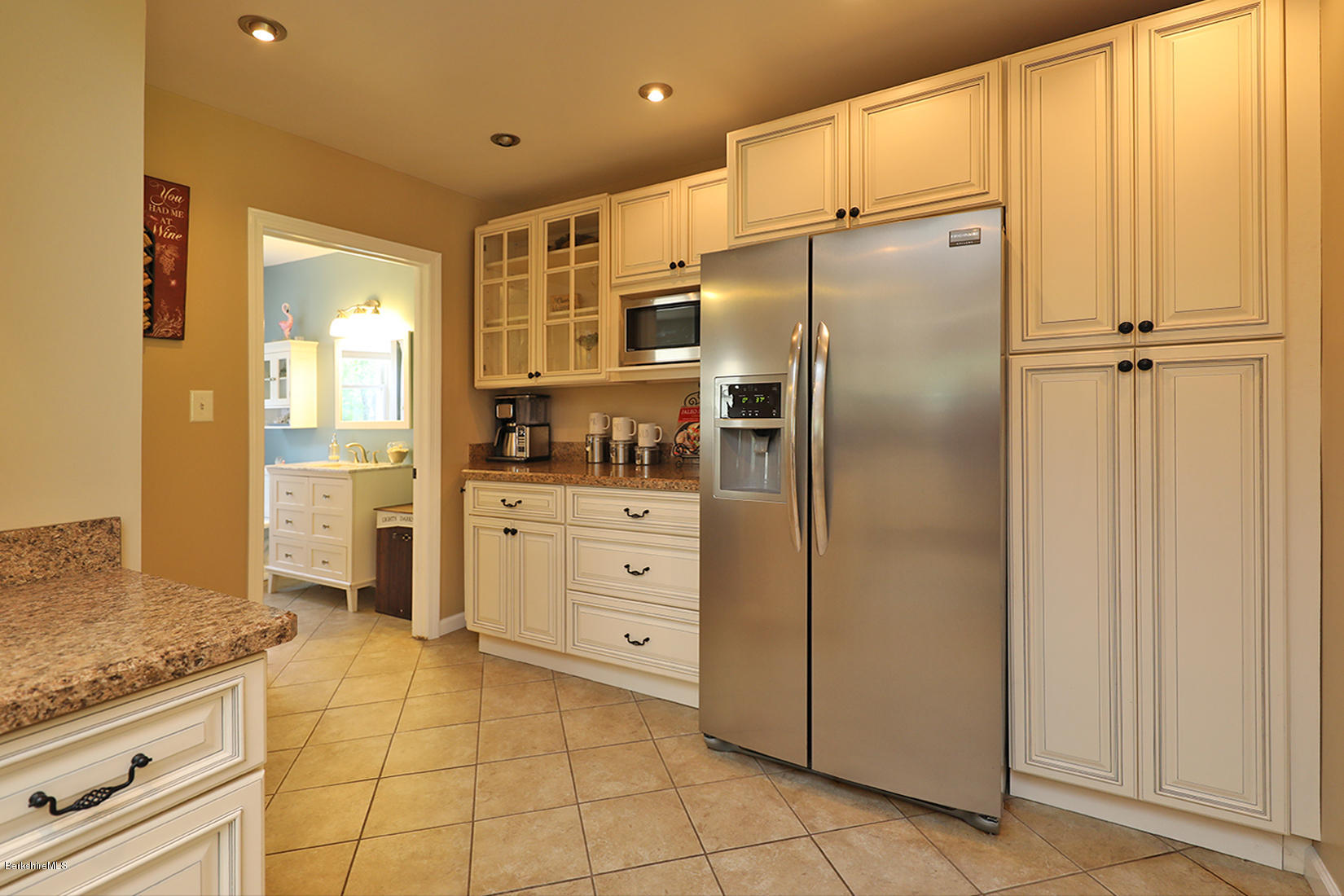 14 Ed Jones Road Otis, MA 01253 - Photo 12 of 28 a kitchen with stainless steel appliances a refrigerator sink and cabinets
