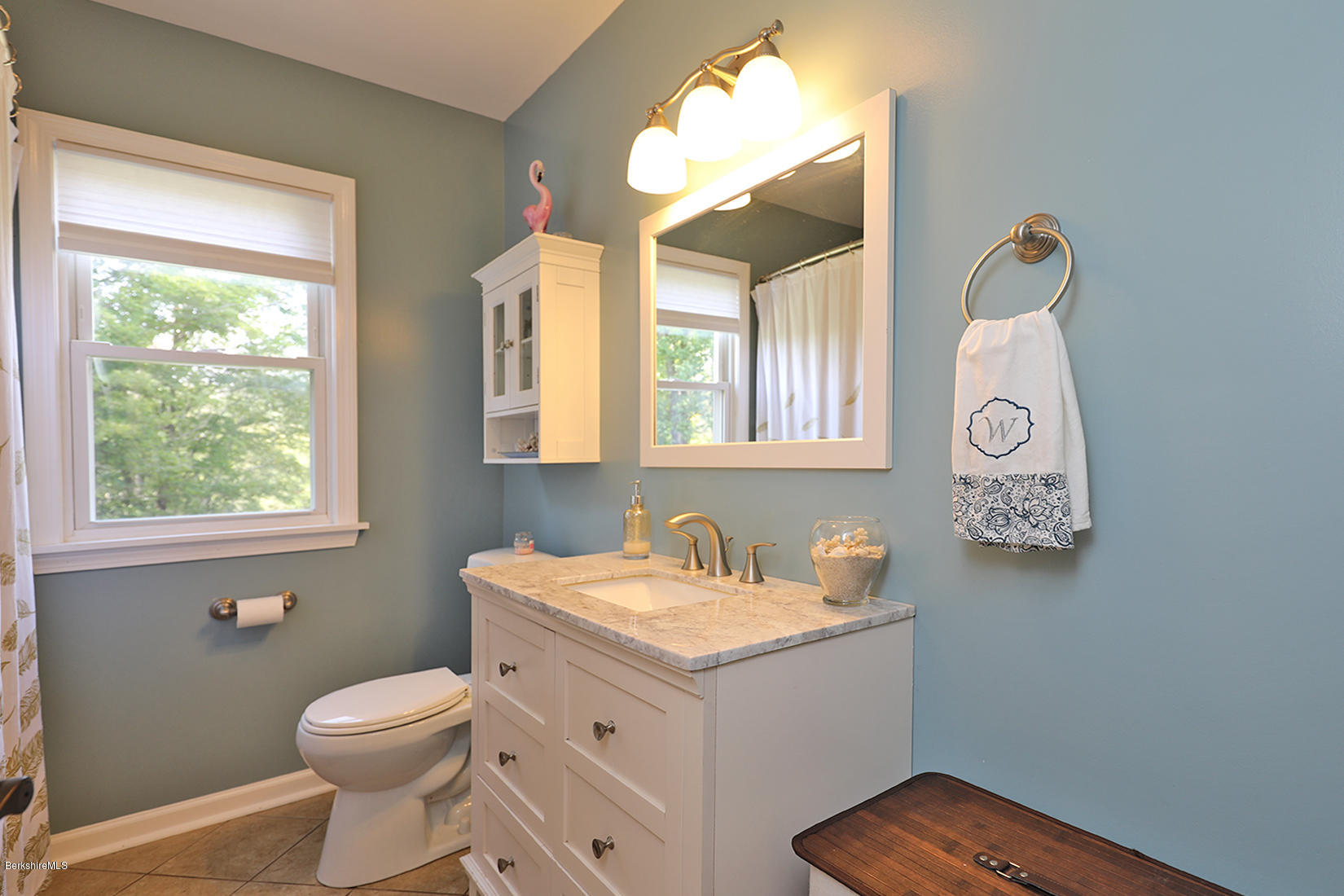 14 Ed Jones Road Otis, MA 01253 - Photo 20 of 28 a bathroom with a sink and a mirror