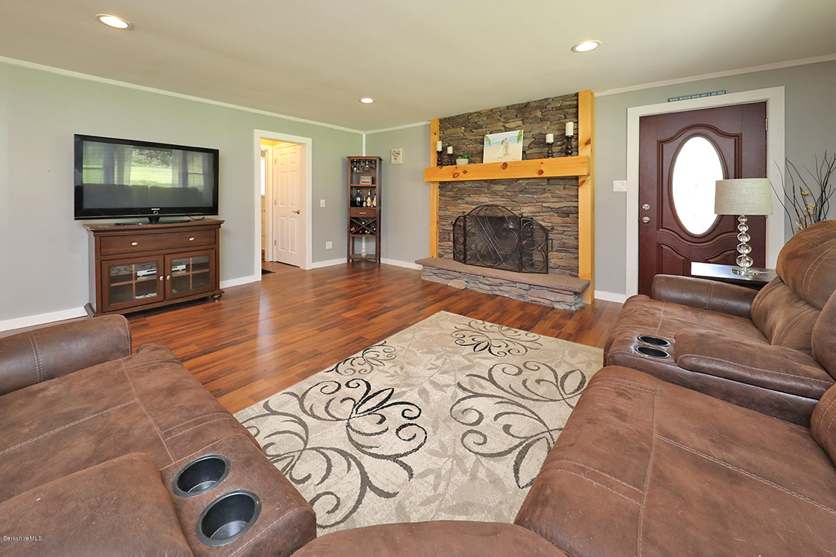 14 Ed Jones Road Otis, MA 01253 - Photo 5 of 28 a living room with furniture and a flat screen tv