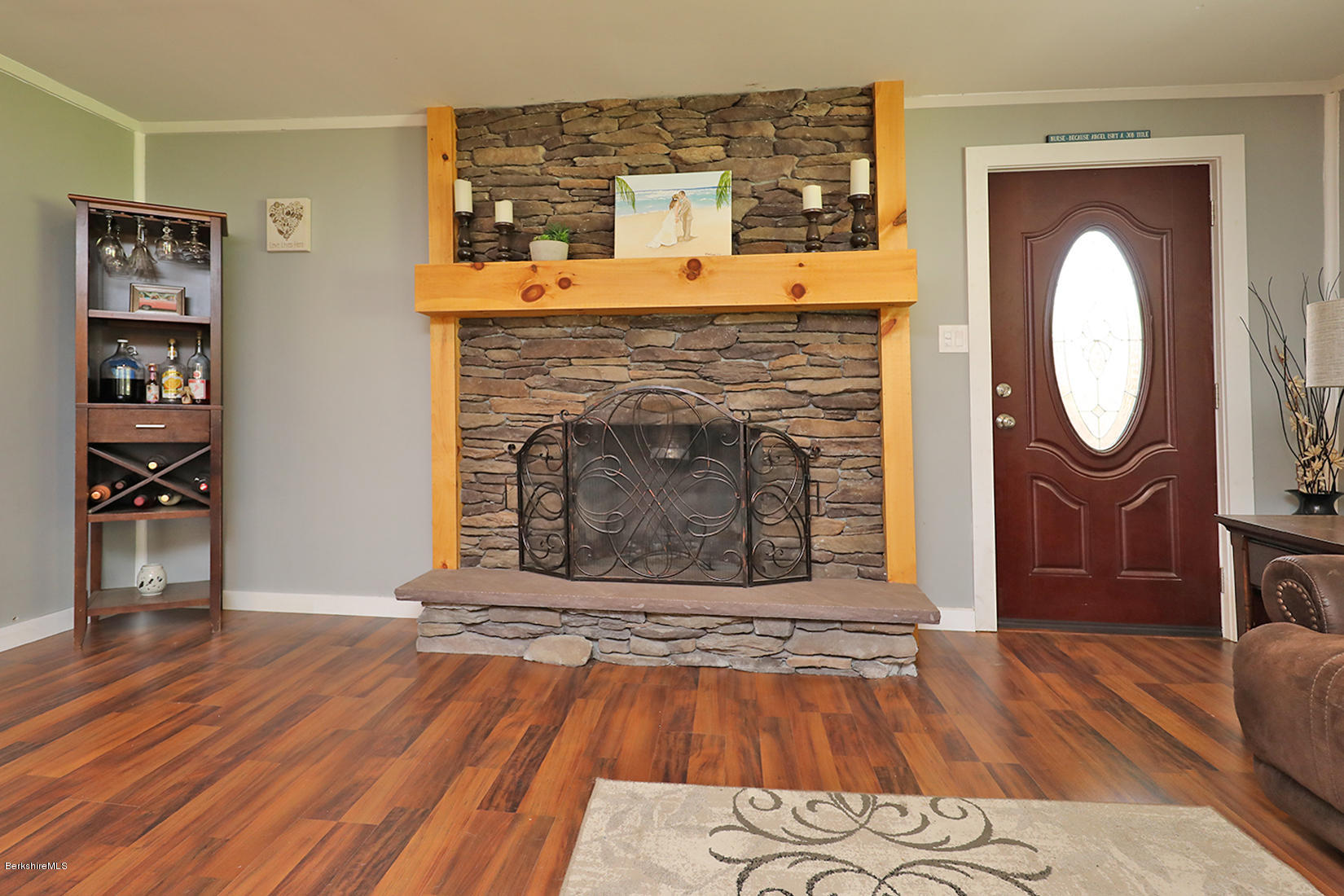 14 Ed Jones Road Otis, MA 01253 - Photo 6 of 28 a living room with furniture and a fireplace
