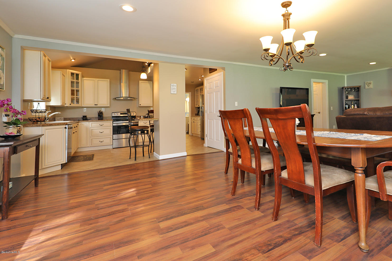 14 Ed Jones Road Otis, MA 01253 - Photo 8 of 28 a view of a dining room with furniture and wooden floor