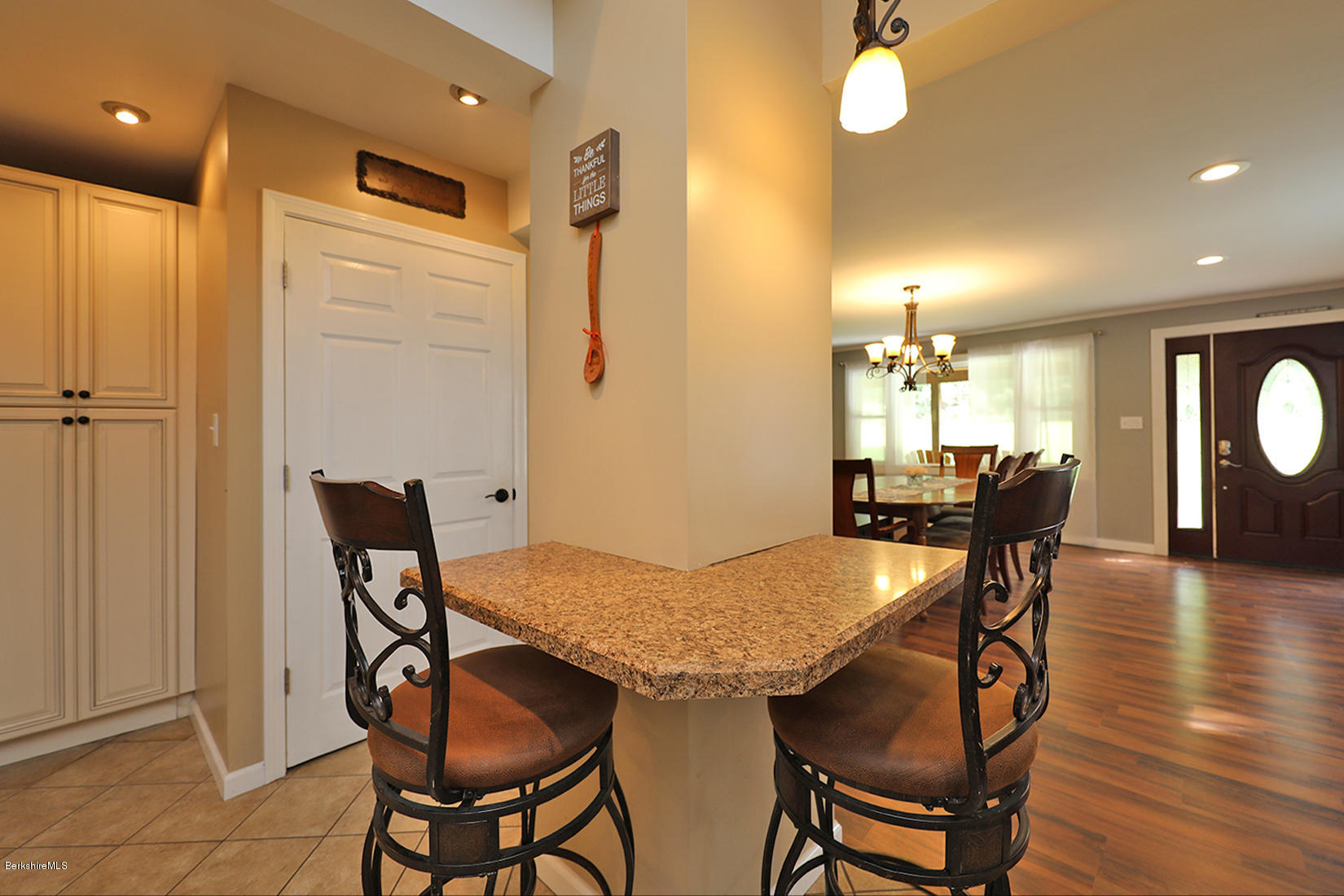 14 Ed Jones Road Otis, MA 01253 - Photo 10 of 28 a view of a dining room with furniture and wooden floor