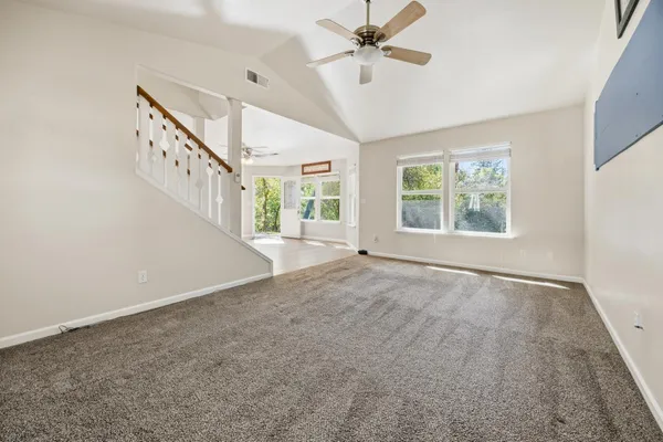 a view of an empty room with a window