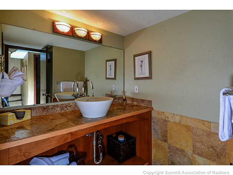 820 Columbine Road, Unit 16B Breckenridge, CO 80424 - Photo 15 of 23 a view of a room with a table and chairs