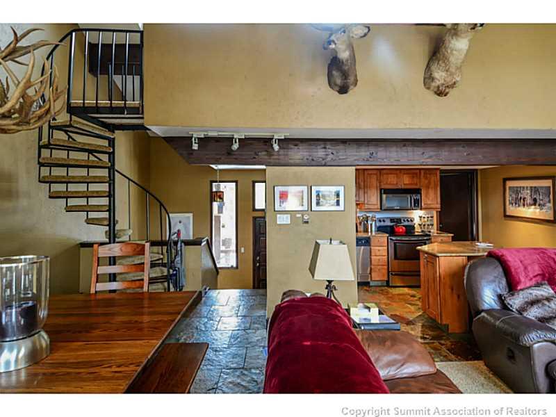 820 Columbine Road, Unit 16B Breckenridge, CO 80424 - Photo 4 of 23 a view of living room with furniture and wooden floor