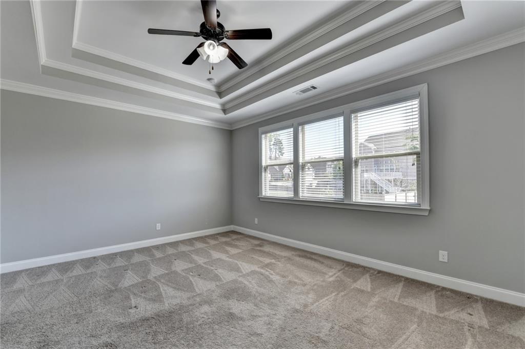 4217 Heisenberg Lane Suwanee, GA 30024 - Photo 33 of 72 a view of an empty room with a window