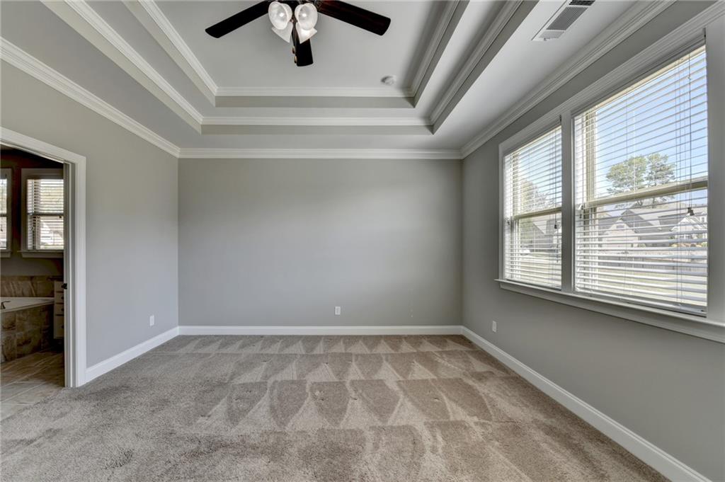 4217 Heisenberg Lane Suwanee, GA 30024 - Photo 34 of 72 wooden floor in an empty room with a window