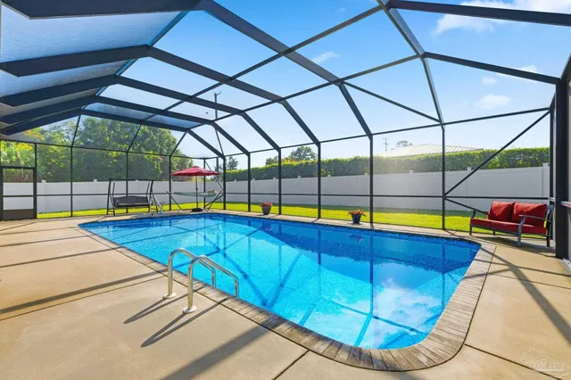 a view of backyard with a garden and entertaining space