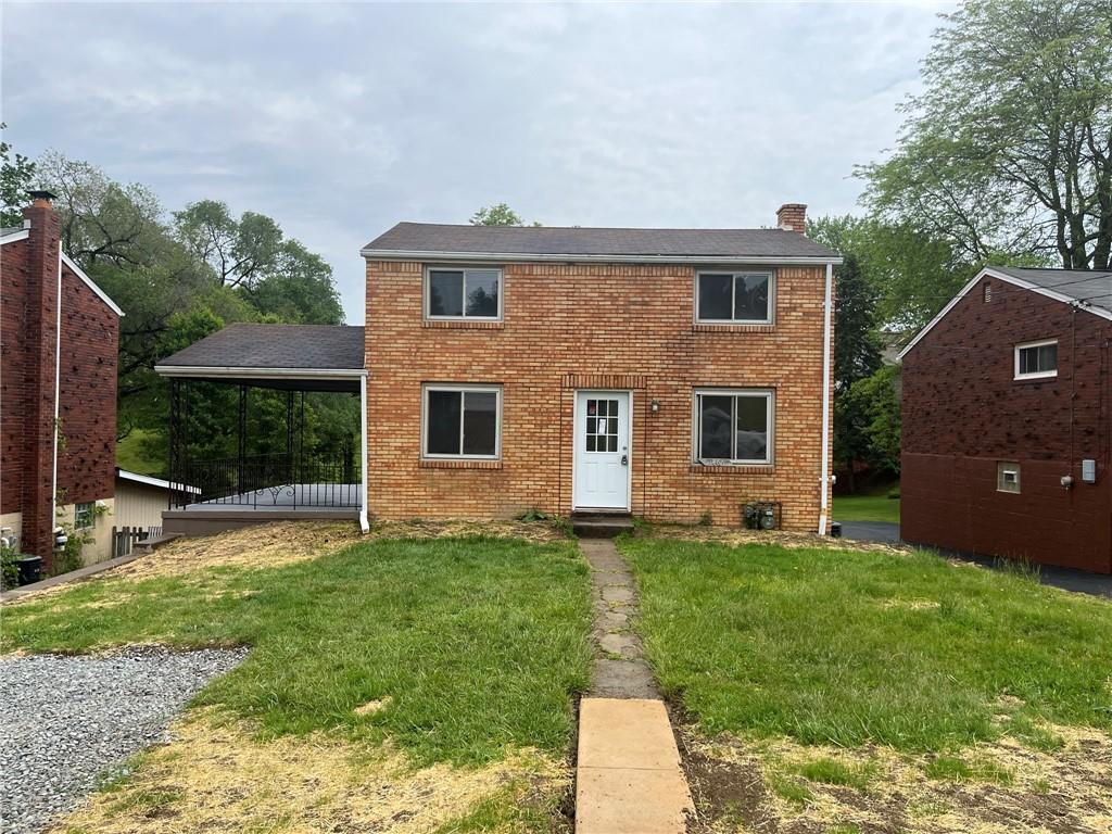 1466 Cathell Road Pittsburgh, PA 15236 - Photo 2 of 32 a view of a backyard with a garden and plants