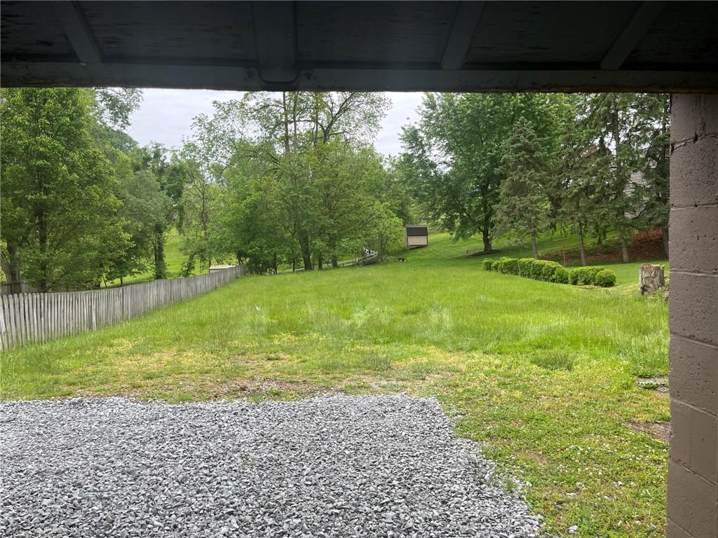 1466 Cathell Road Pittsburgh, PA 15236 - Photo 30 of 32 a view of a backyard with a small cabin