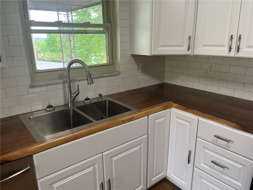 1466 Cathell Road Pittsburgh, PA 15236 - Photo 8 of 32 a kitchen with a sink and cabinets