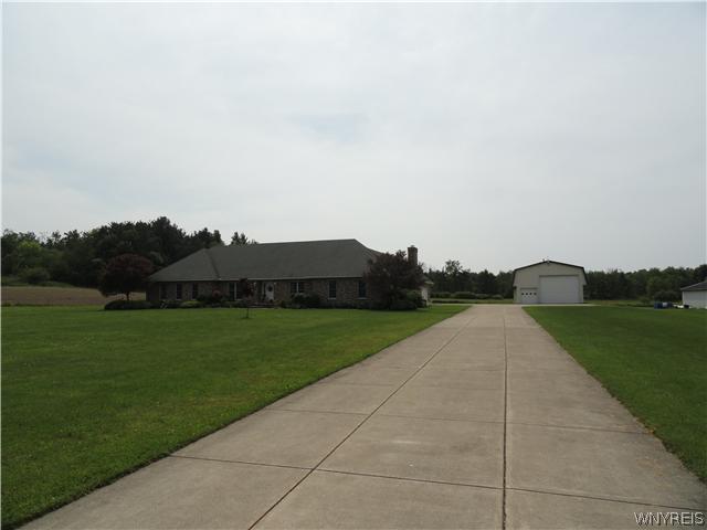 7448 East Eden Road Eden, NY 14057 - Photo 1 of 1 Exterior Front. All brick 4200 square foot home wi