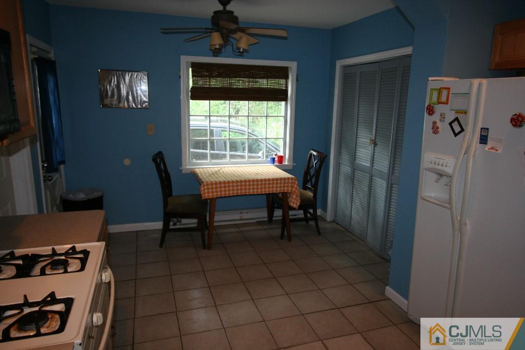 5 Washington Road Sayreville, NJ 08859 - Photo 11 of 20 a dining room with furniture and window