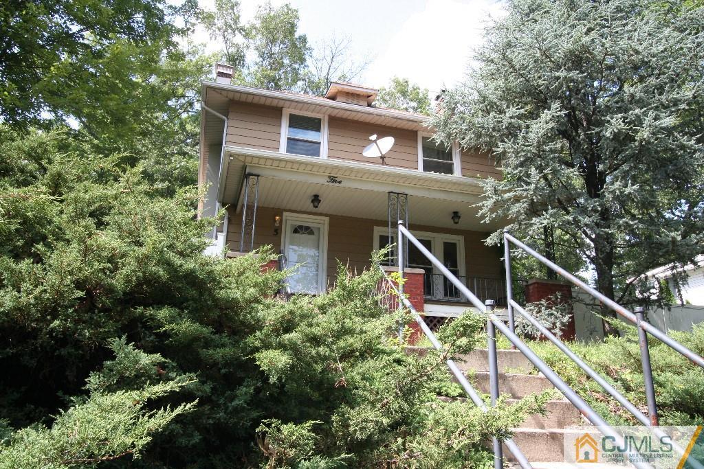 5 Washington Road Sayreville, NJ 08859 - Photo 20 of 20 a view of a house with a small yard