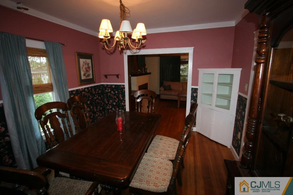 5 Washington Road Sayreville, NJ 08859 - Photo 6 of 20 a view of a dining room with furniture and chandelier