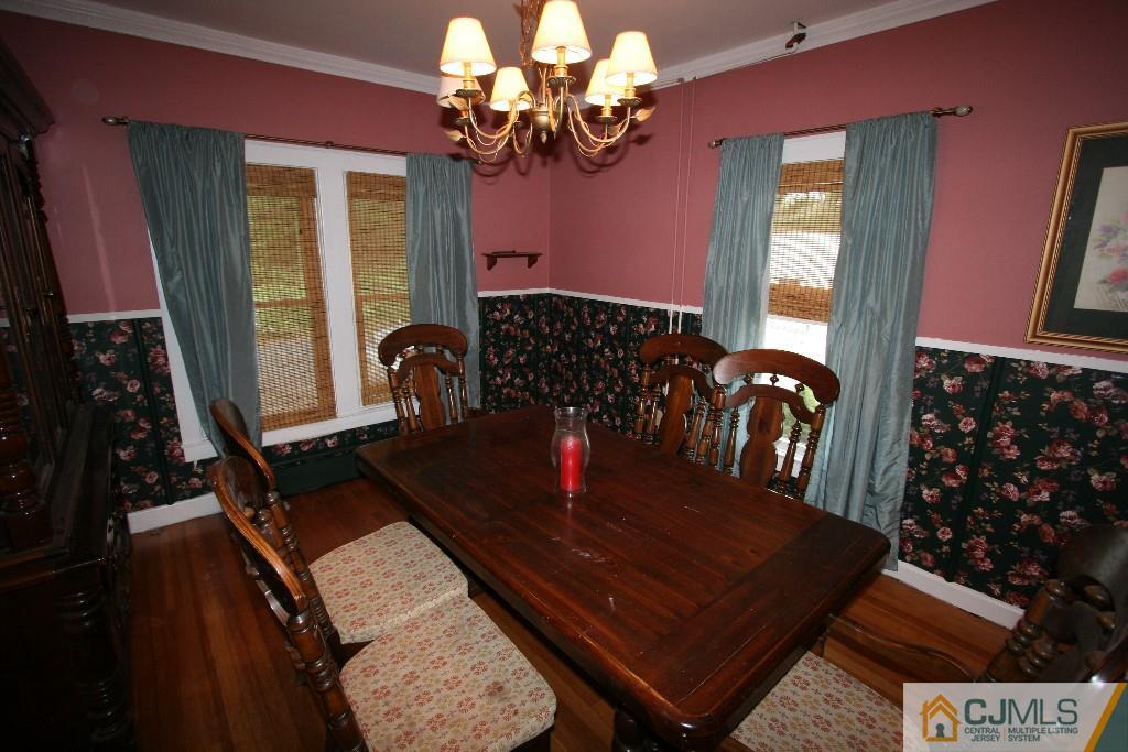 5 Washington Road Sayreville, NJ 08859 - Photo 7 of 20 a view of a dining room with furniture and chandelier