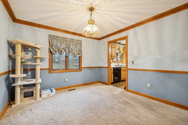 a bedroom with a bed and furniture