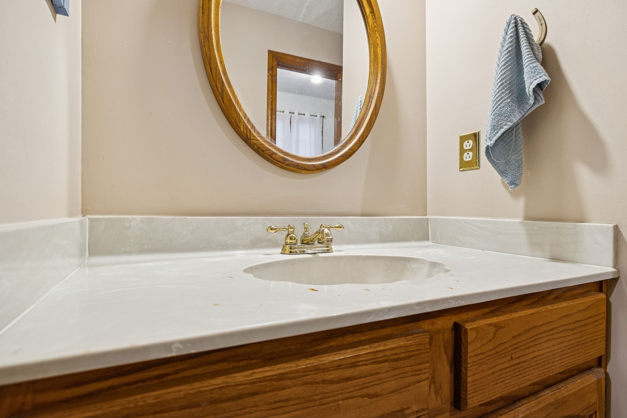 121 Kimberly Lane Pleasant View, TN 37146 - Photo 14 of 42 a bathroom with a sink and a mirror