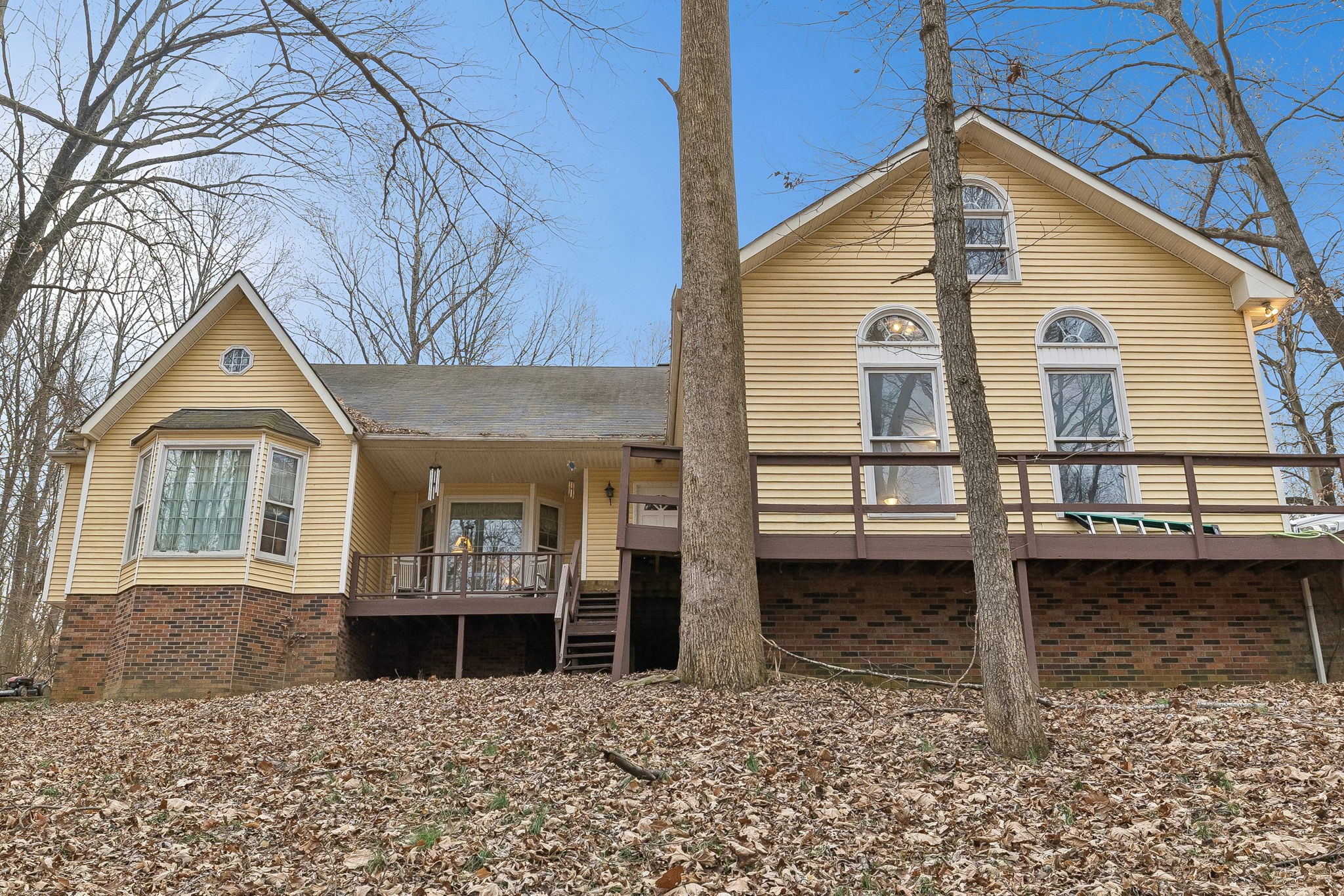 121 Kimberly Lane Pleasant View, TN 37146 - Photo 2 of 42 a front view of a house with garage