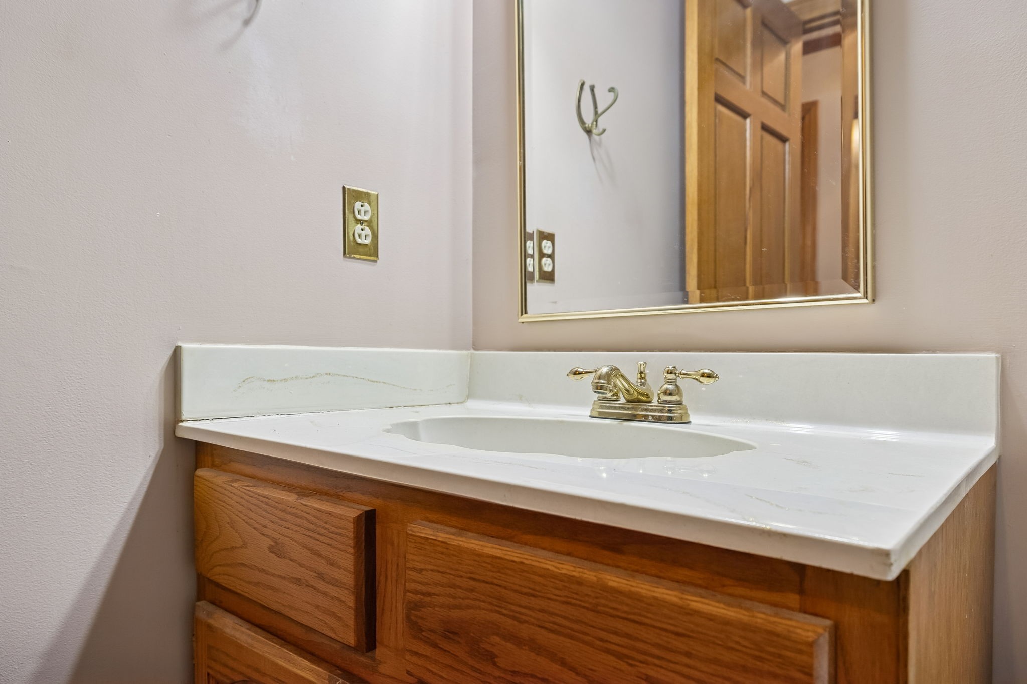 121 Kimberly Lane Pleasant View, TN 37146 - Photo 25 of 42 a bathroom with a sink and a mirror