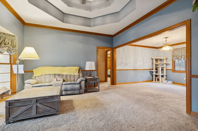 a bedroom with furniture and a window