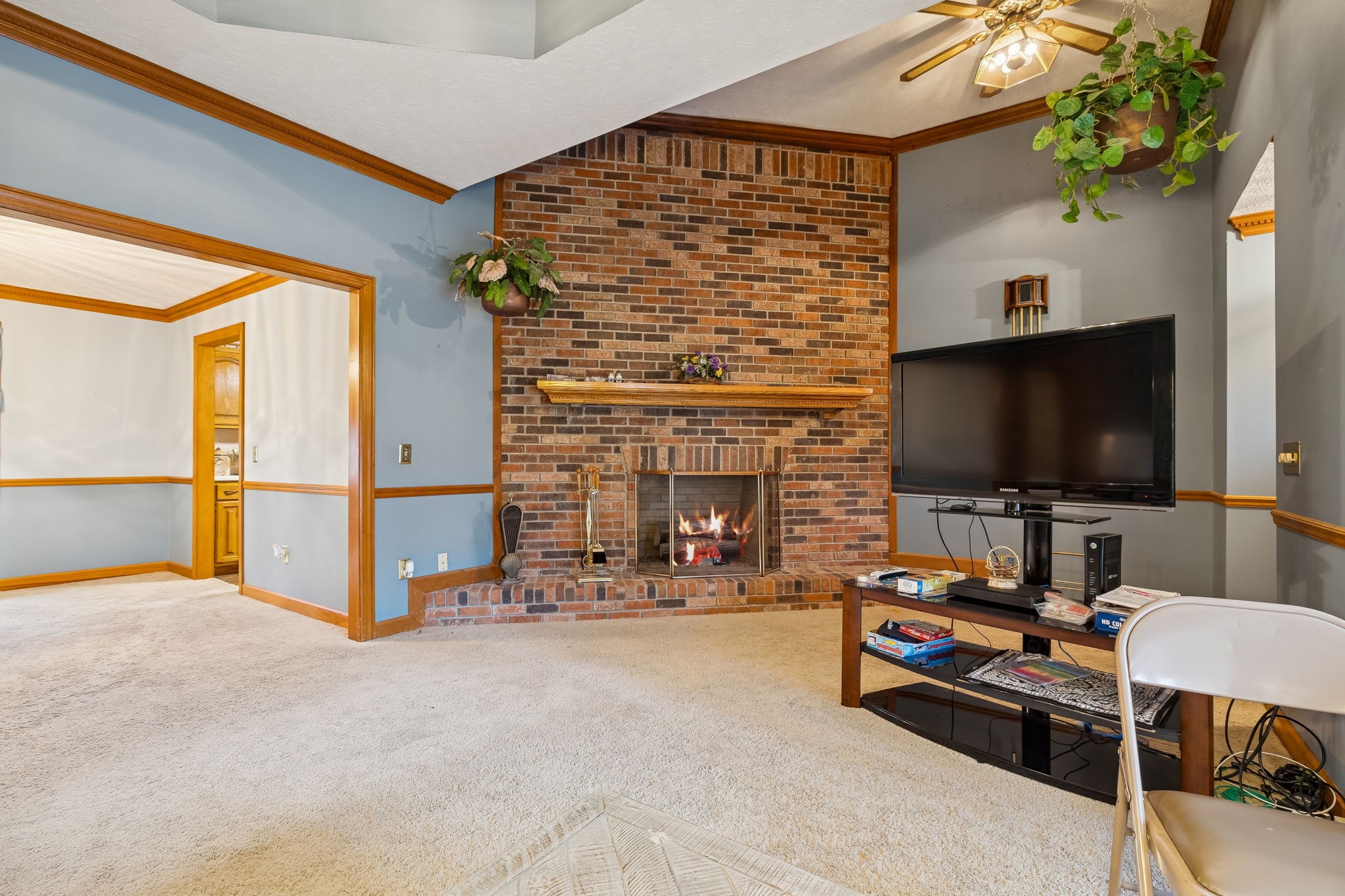 121 Kimberly Lane Pleasant View, TN 37146 - Photo 9 of 42 a view of a livingroom with furniture and a flat screen tv