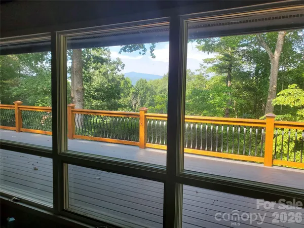 a view of a balcony with lake view