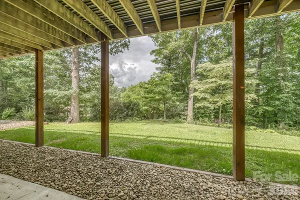 a view of a porch with a backyard