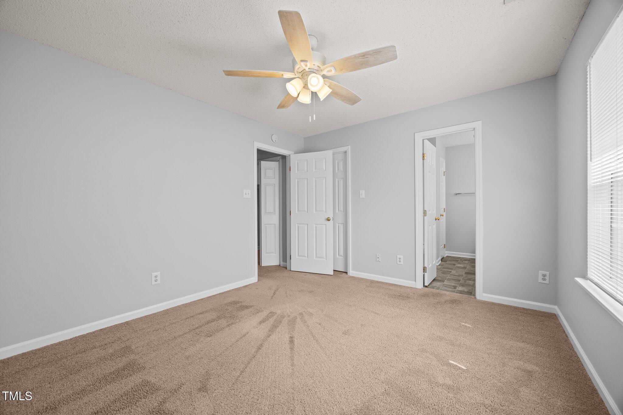 4406 Still Pines Drive Raleigh, NC 27613 - Photo 19 of 39 a view of an empty room with a window