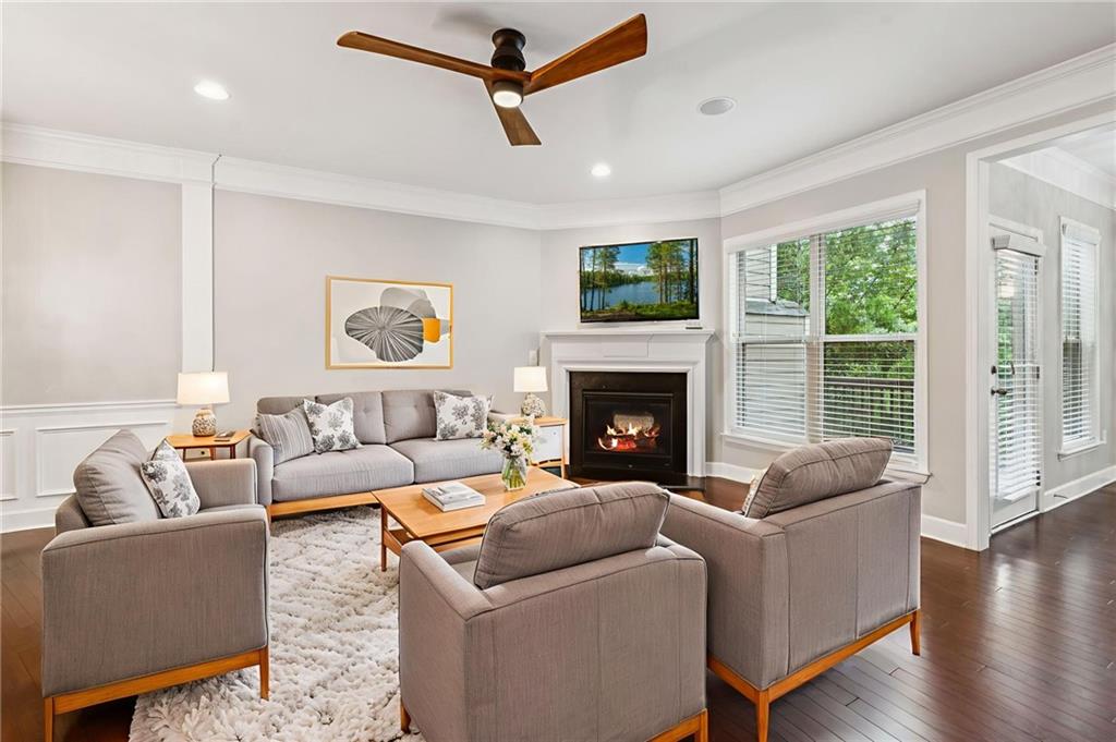 1514 Woodbridge Way Northeast Atlanta, GA 30329 - Photo 16 of 54 a living room with furniture and a fireplace