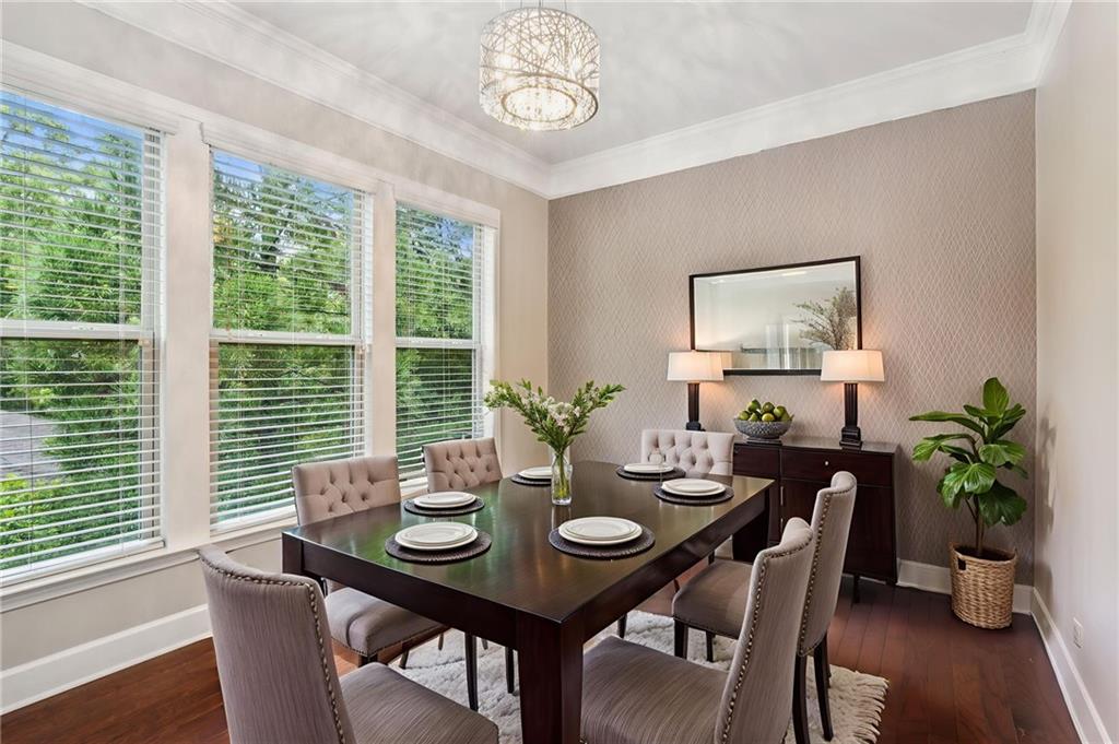 1514 Woodbridge Way Northeast Atlanta, GA 30329 - Photo 20 of 54 a view of a dining room with furniture window and wooden floor