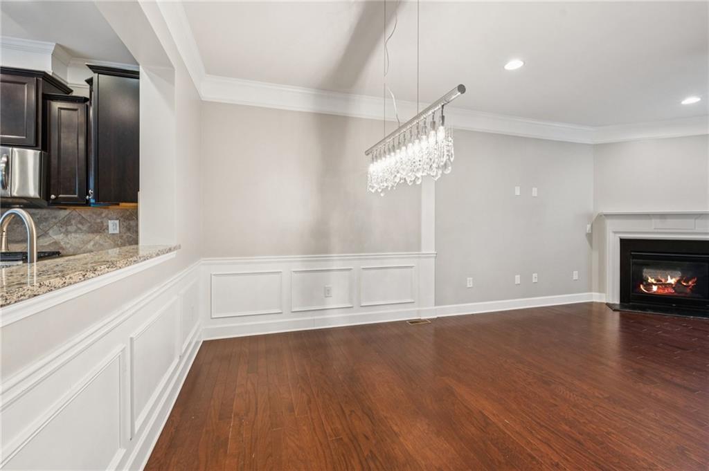 1514 Woodbridge Way Northeast Atlanta, GA 30329 - Photo 27 of 54 a view of an empty room and wooden floor