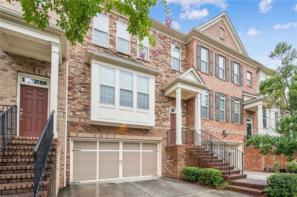 1514 Woodbridge Way Northeast Atlanta, GA 30329 - Photo 3 of 54 a front view of a house