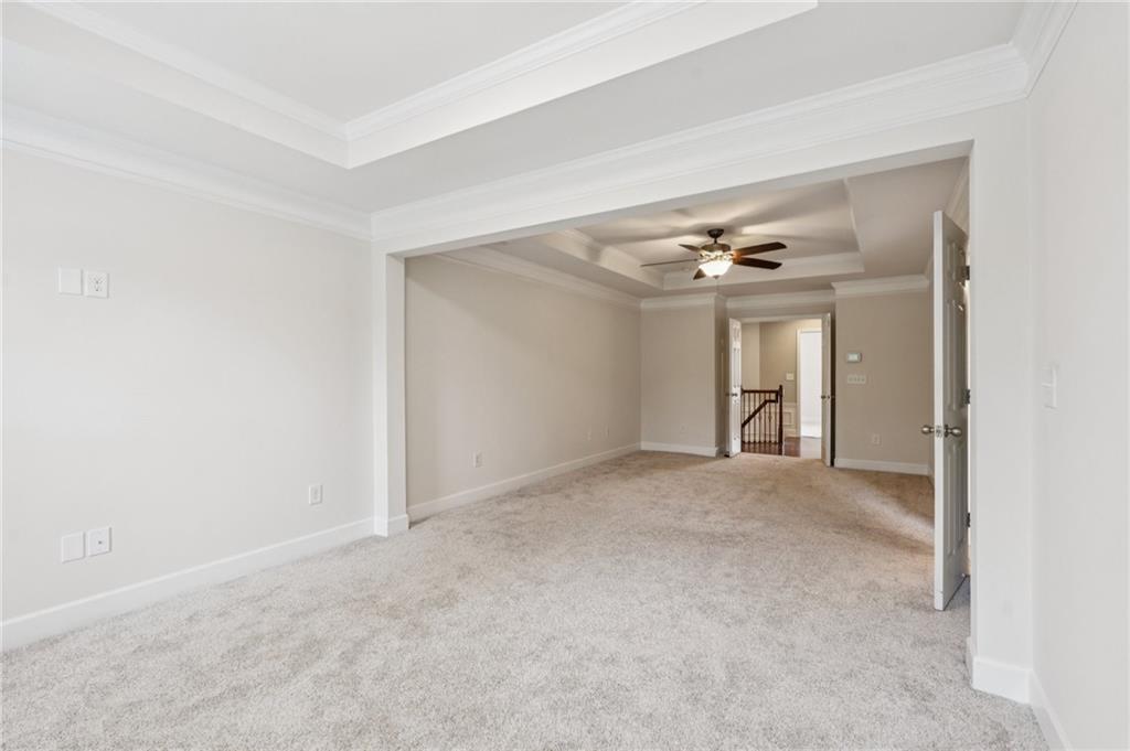 1514 Woodbridge Way Northeast Atlanta, GA 30329 - Photo 31 of 54 a view of an empty room and chandelier