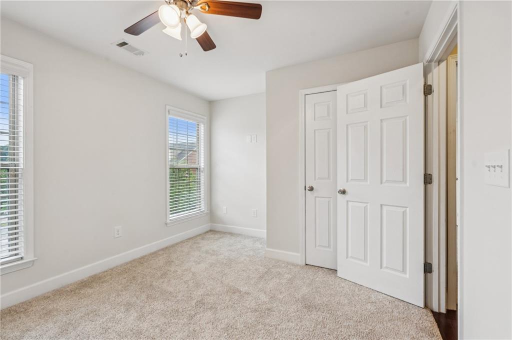 1514 Woodbridge Way Northeast Atlanta, GA 30329 - Photo 39 of 54 a view of an empty room with a window