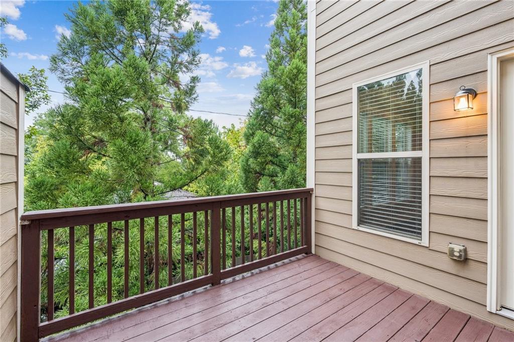 1514 Woodbridge Way Northeast Atlanta, GA 30329 - Photo 45 of 54 a view of a balcony with wooden floor
