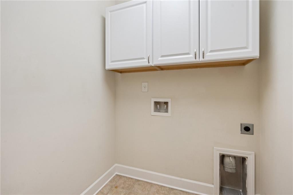1514 Woodbridge Way Northeast Atlanta, GA 30329 - Photo 48 of 54 a view of door with cabinets
