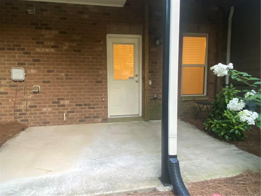 1514 Woodbridge Way Northeast Atlanta, GA 30329 - Photo 49 of 54 a view of a door and a yard