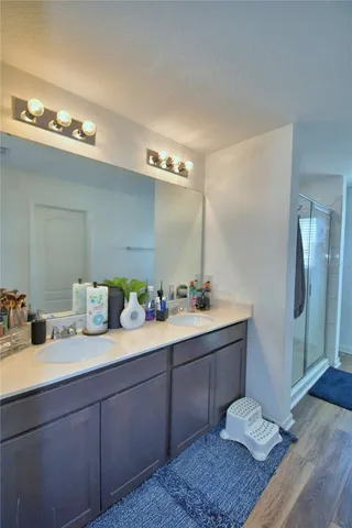 a room with toys and a wooden floor