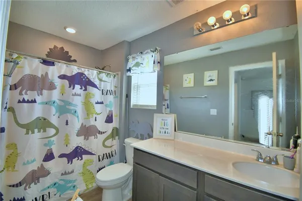 a outdoor living space with furniture and a potted plant