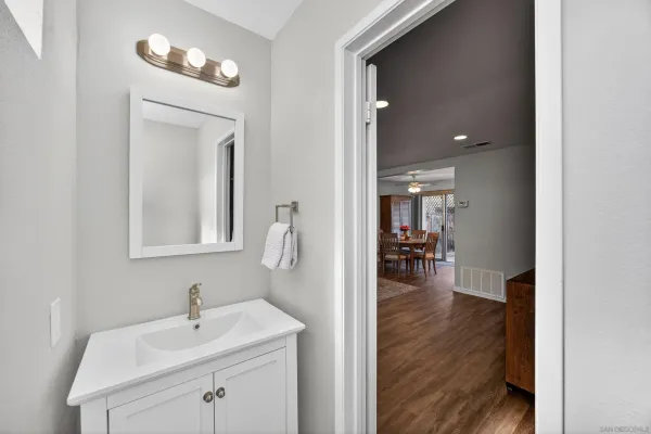 a bedroom with a bed and a balcony