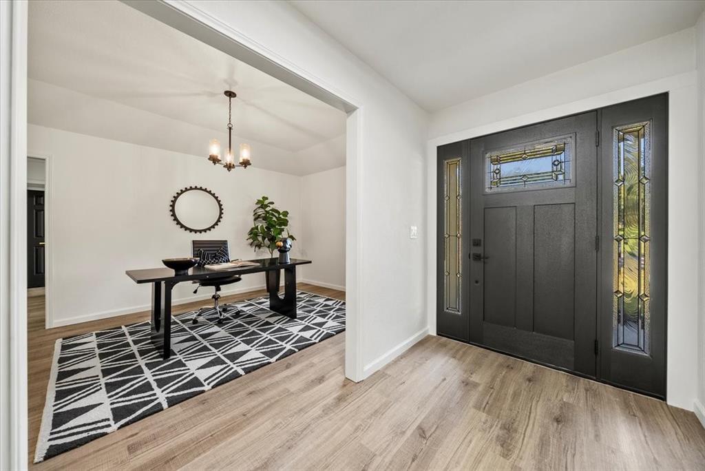 3609 Hidalgo Street Irving, TX 75062 - Photo 18 of 40 a view of a livingroom with furniture and wooden floor