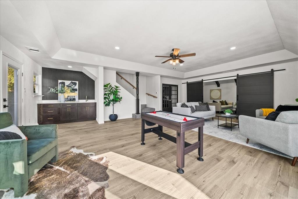 3609 Hidalgo Street Irving, TX 75062 - Photo 25 of 40 a living room with furniture and wooden floor