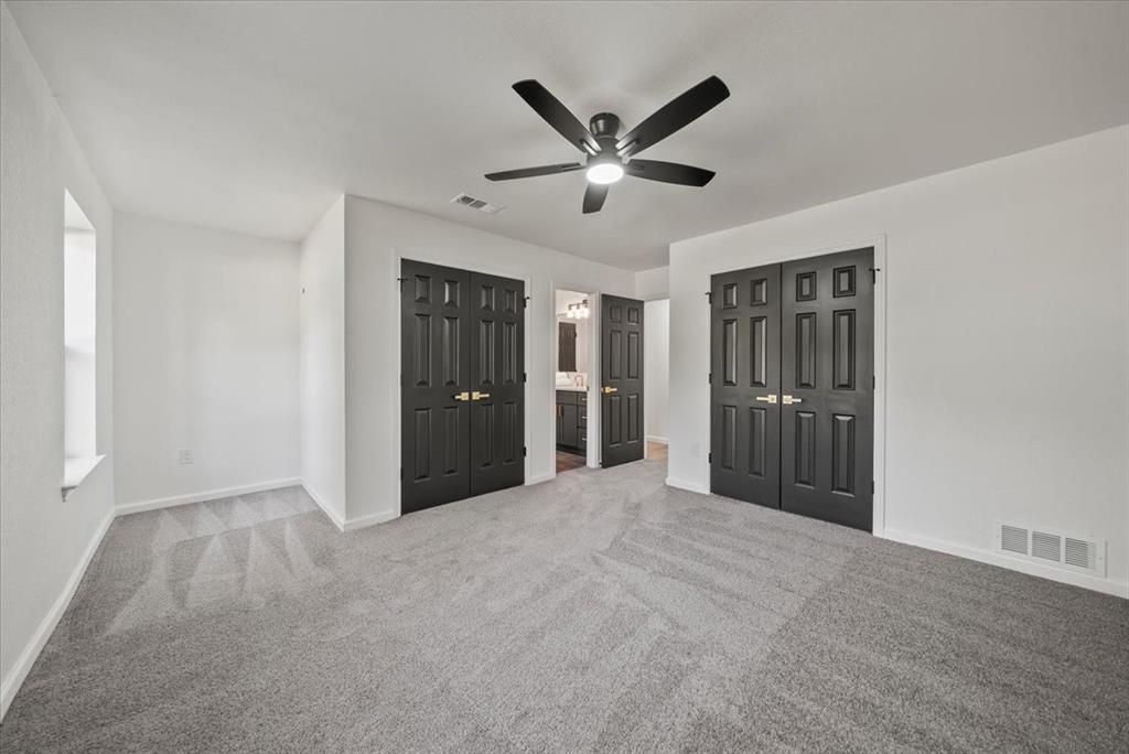 3609 Hidalgo Street Irving, TX 75062 - Photo 32 of 40 a view of a livingroom with a ceiling fan & entryway