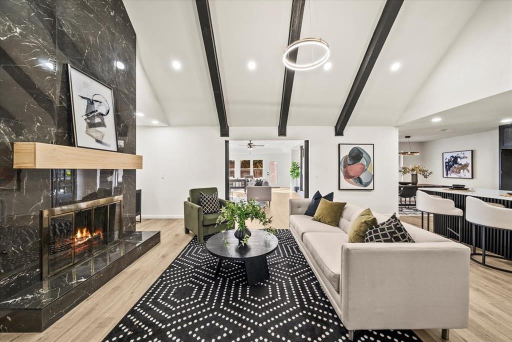 3609 Hidalgo Street Irving, TX 75062 - Photo 5 of 40 a living room with furniture and a fireplace