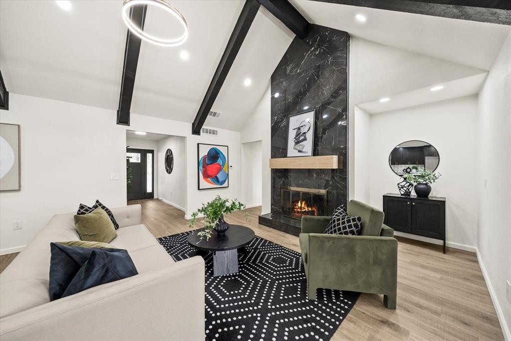 3609 Hidalgo Street Irving, TX 75062 - Photo 7 of 40 a living room with furniture and a fireplace