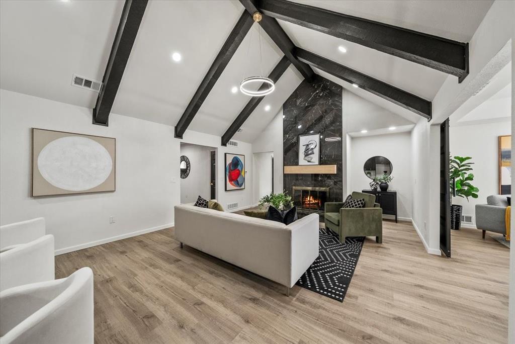 3609 Hidalgo Street Irving, TX 75062 - Photo 8 of 40 a living room with furniture and a wooden floor