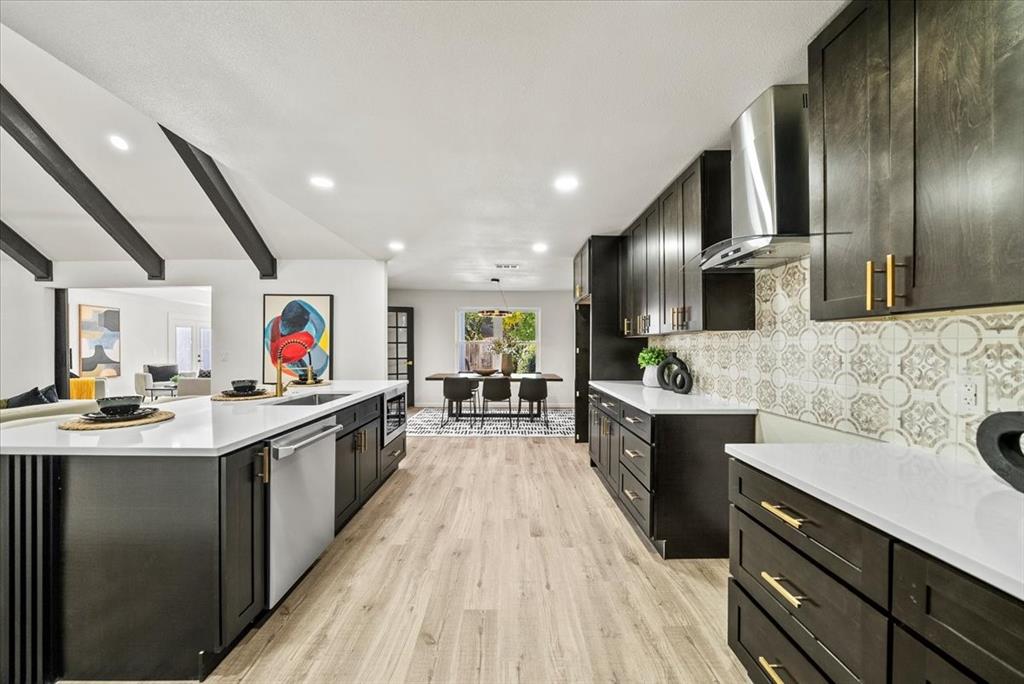 3609 Hidalgo Street Irving, TX 75062 - Photo 10 of 40 a kitchen with stainless steel appliances granite countertop a sink stove and refrigerator